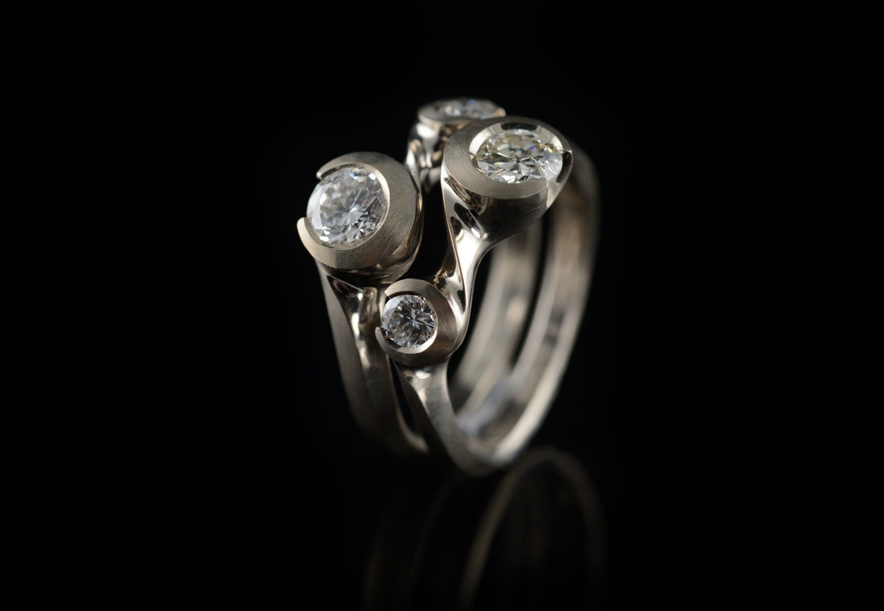 Hand-carved interlocking pair of diamond and gold rings – McCaul