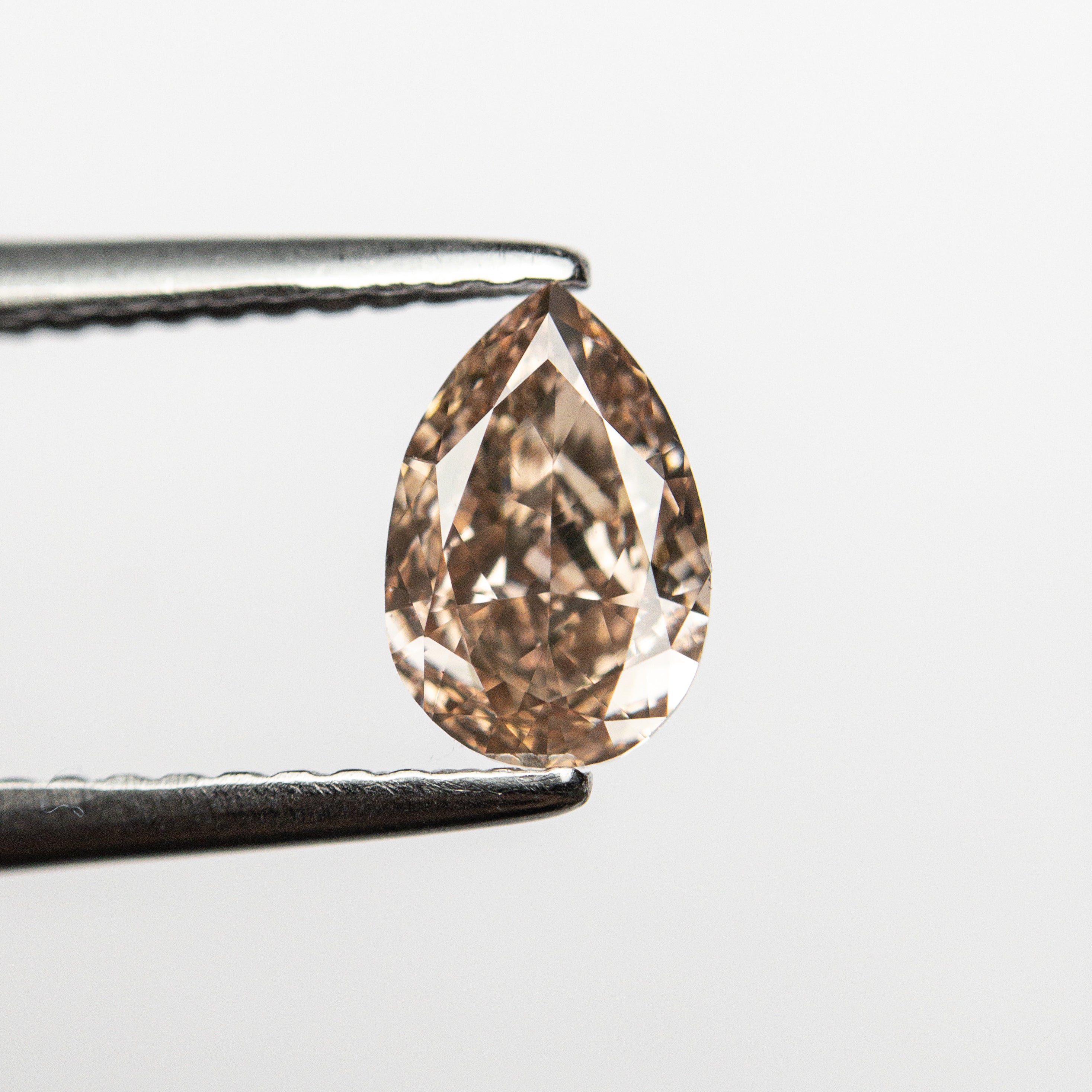 0.68ct 7.06x4.68x2.76mm VS2 Fancy Brownish Pink Pear Brilliant 🇦🇺 24112-01