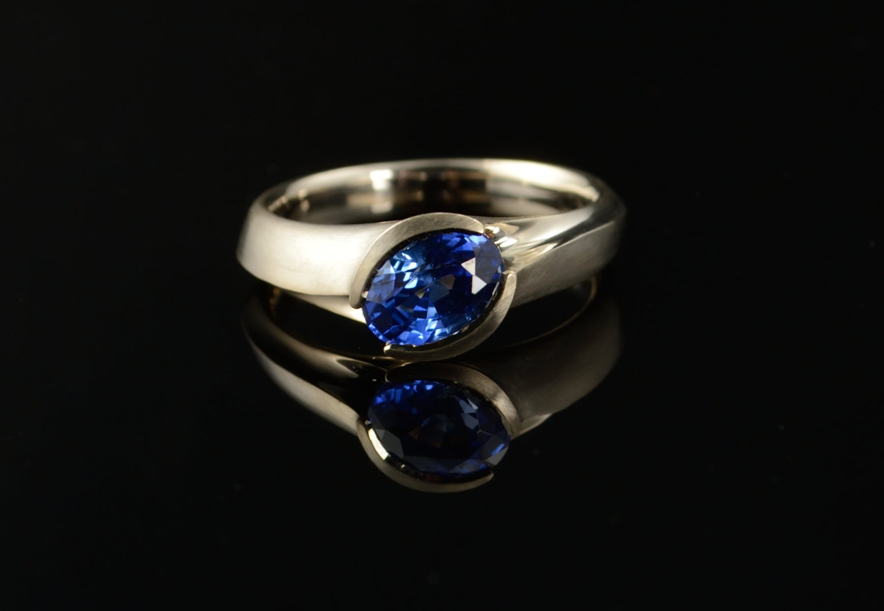 Arris blue sapphire white gold engagement ring