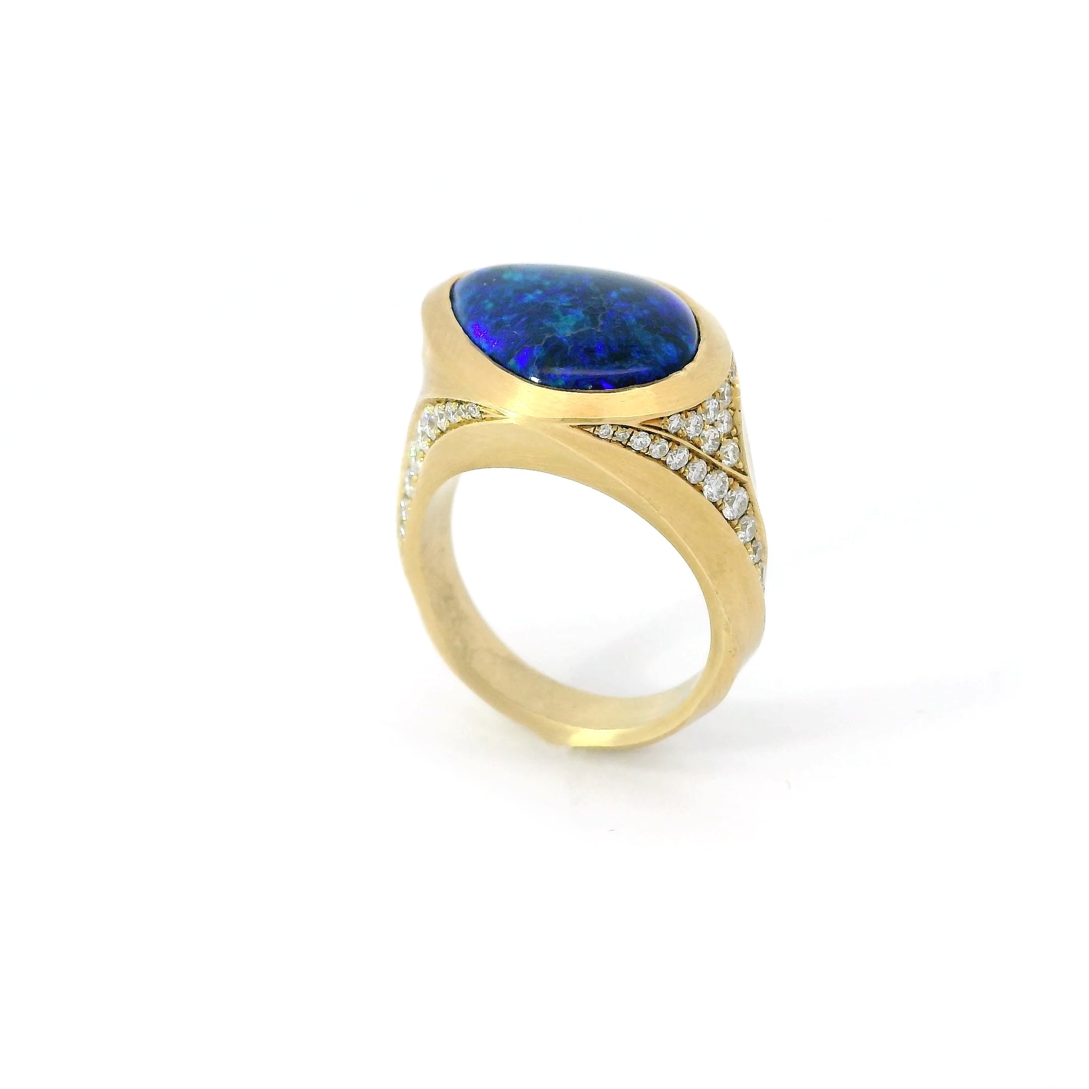 Lightning ridge opal and diamond Arris ring.