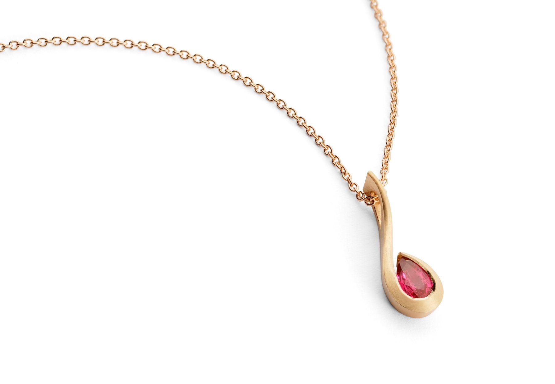 Rose gold and pear shaped ruby twist pendant