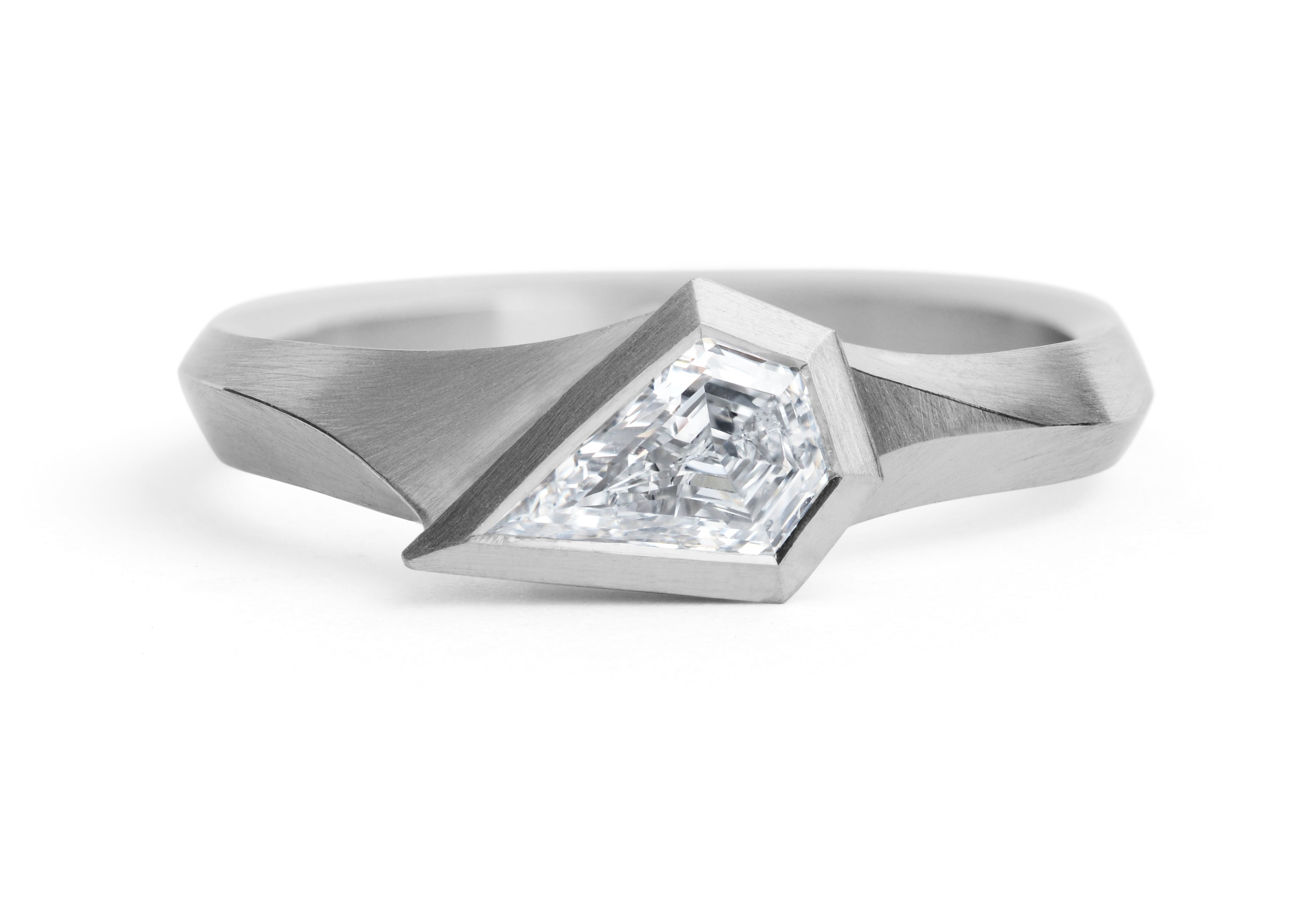 Aegis ring with shield shaped diamond