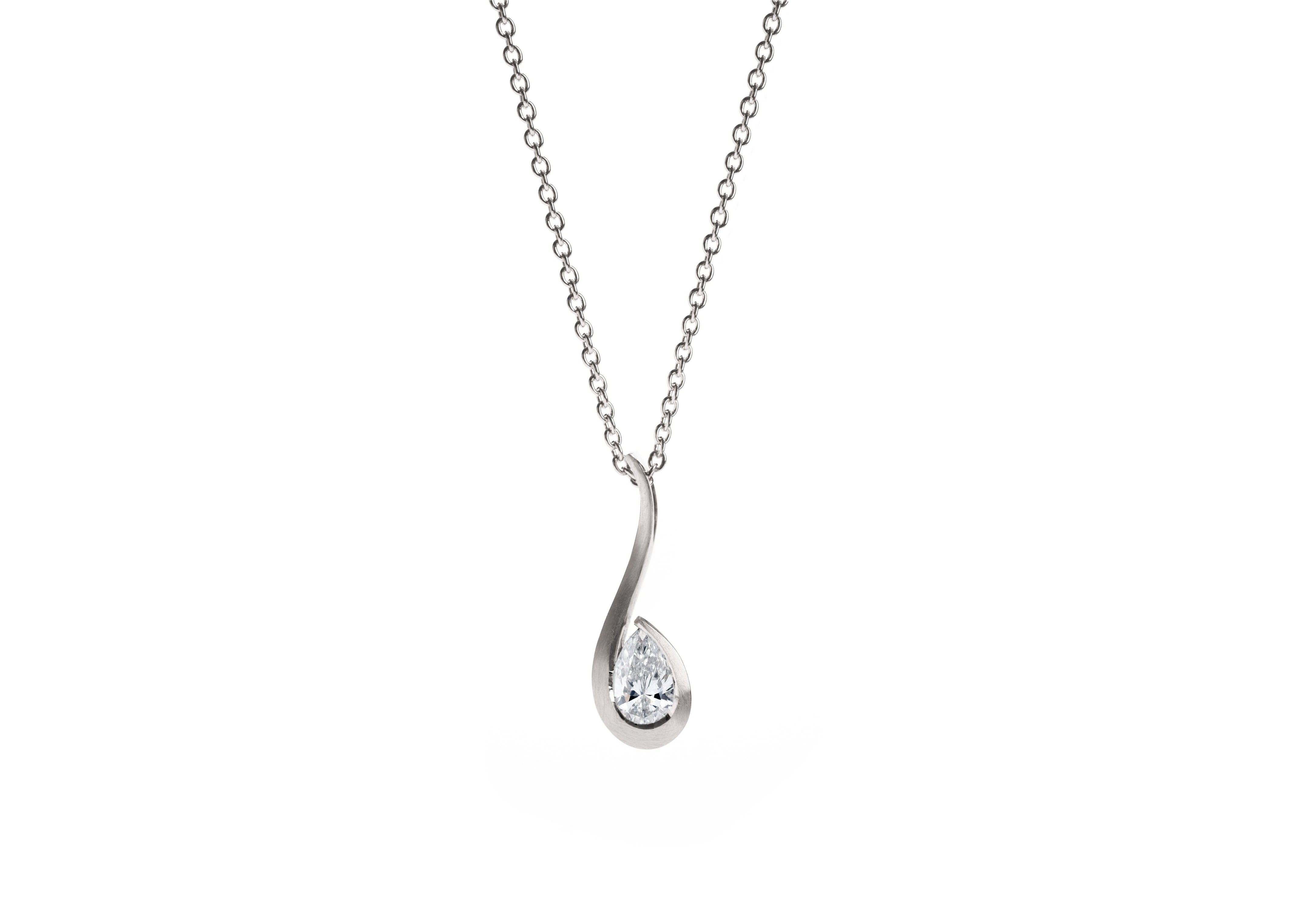 Platinum and pear shaped white diamond Twist pendant