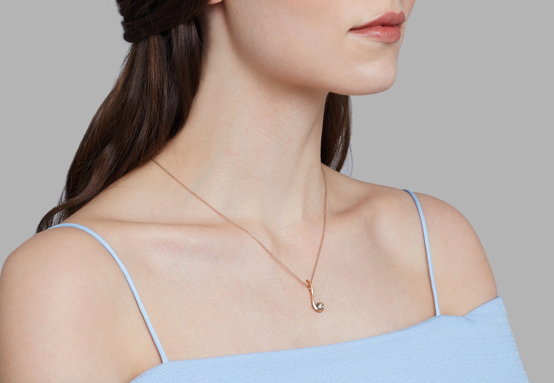 Rose gold and cognac diamond 'Twist' pendant on model