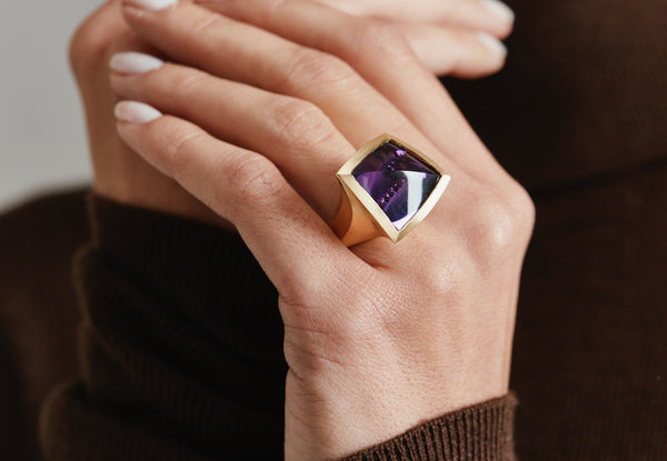 Arris: Fancy cut 16 carat amethyst set in yellow gold.-McCaul