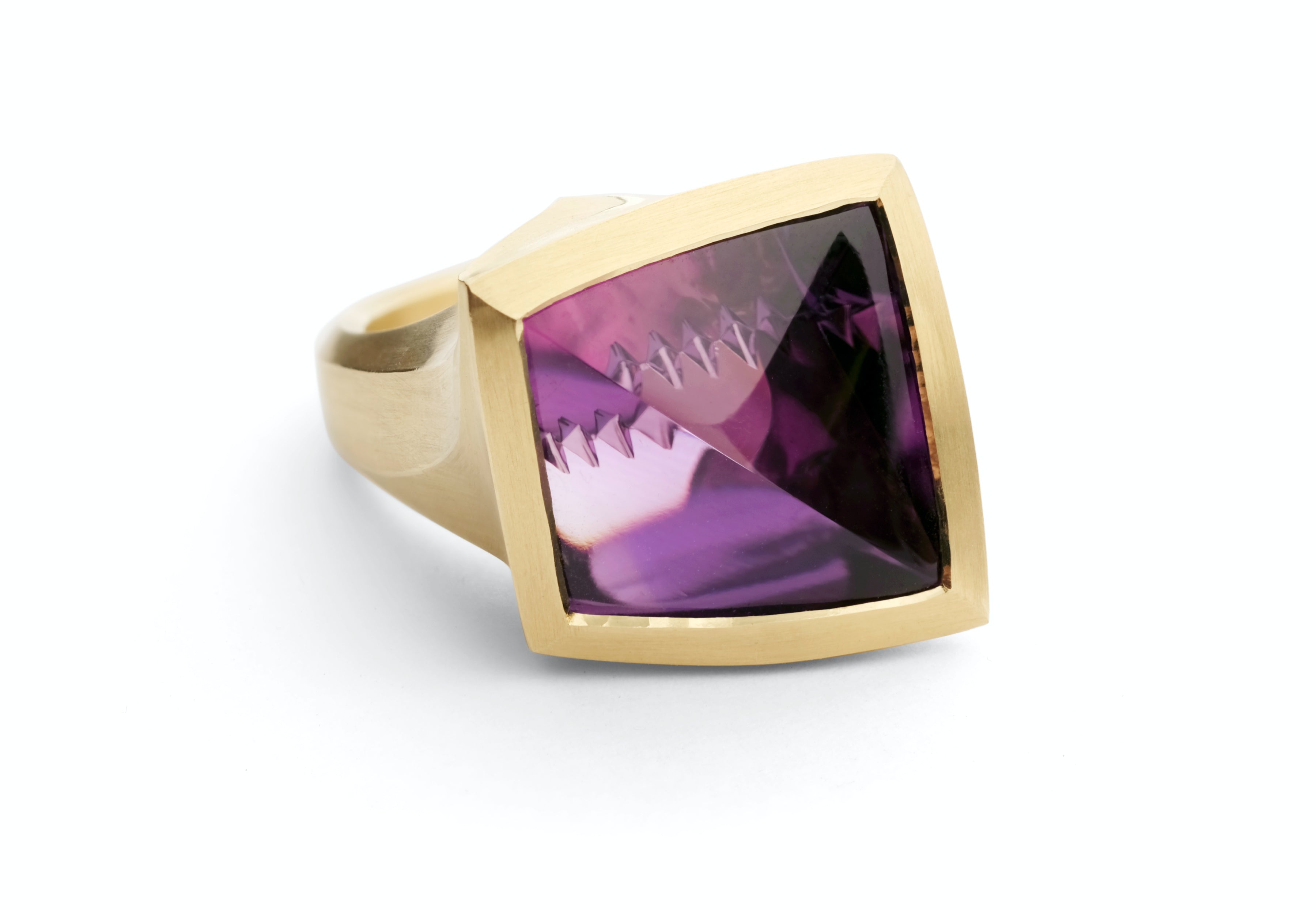 Arris: Fancy cut 16 carat amethyst set in yellow gold.-McCaul