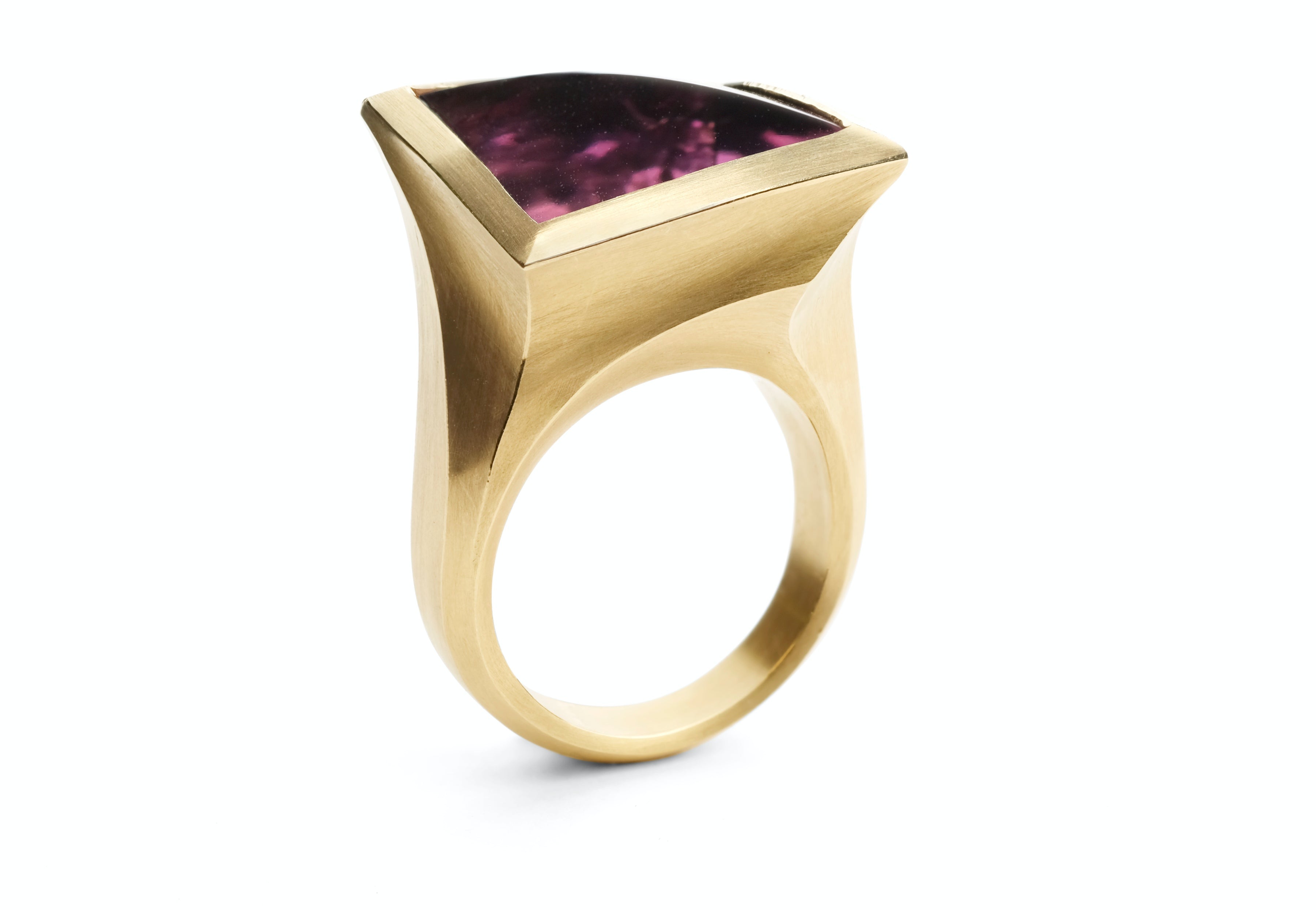 Arris: Fancy cut 16 carat amethyst set in yellow gold.-McCaul